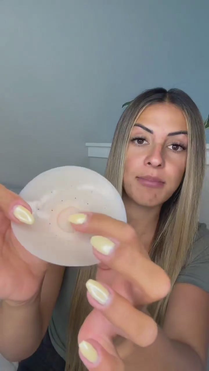 woman holding an imonopick silicone nipple cover with water droplets, with “Waterproof Confidence,” waterproof, no-slip, and reusable text