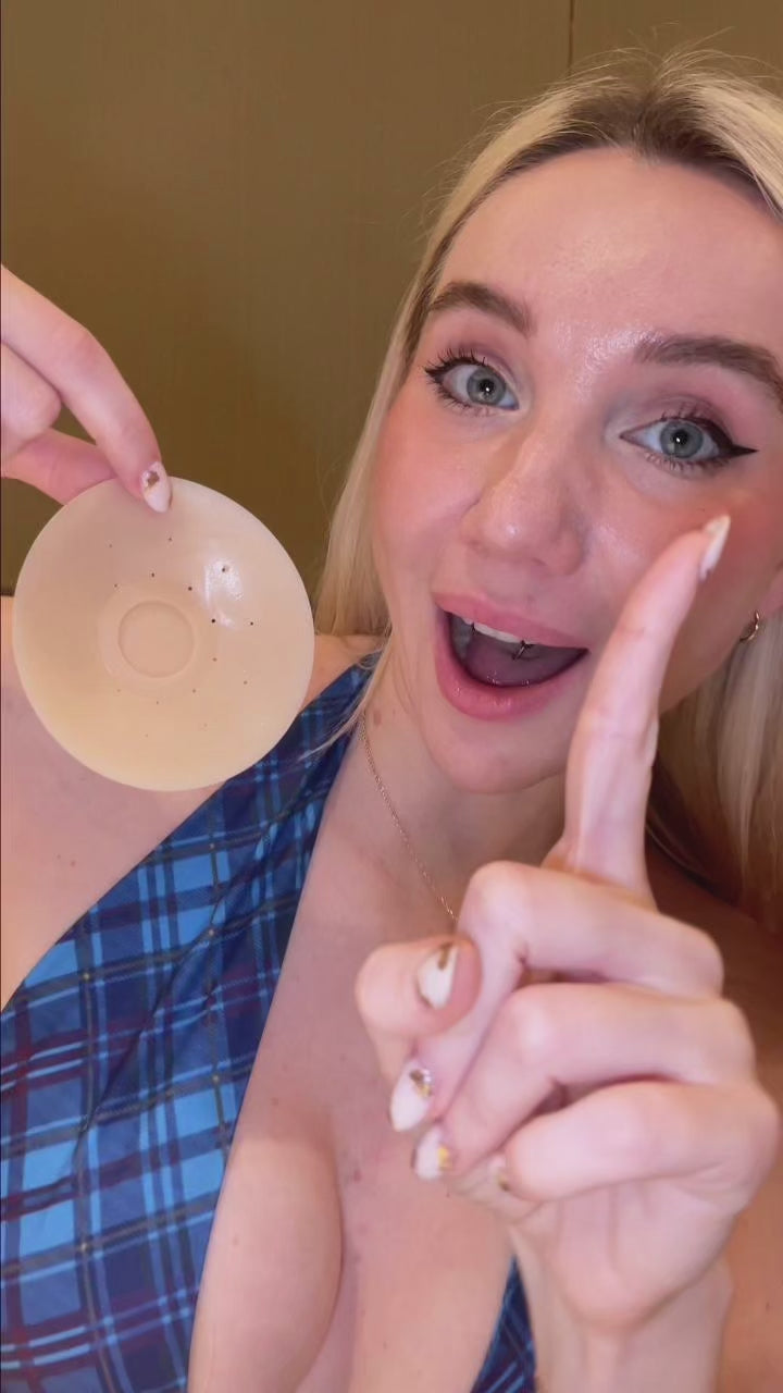 woman holding imonopick nude silicone nipple covers, with “One Pair, Many Outfits,” invisible, reusable, and breathable text